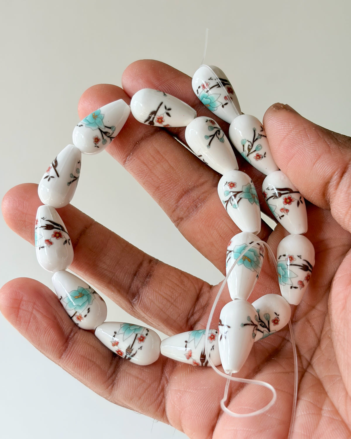 3.0 drop shape ceramic flower beads - 1 line