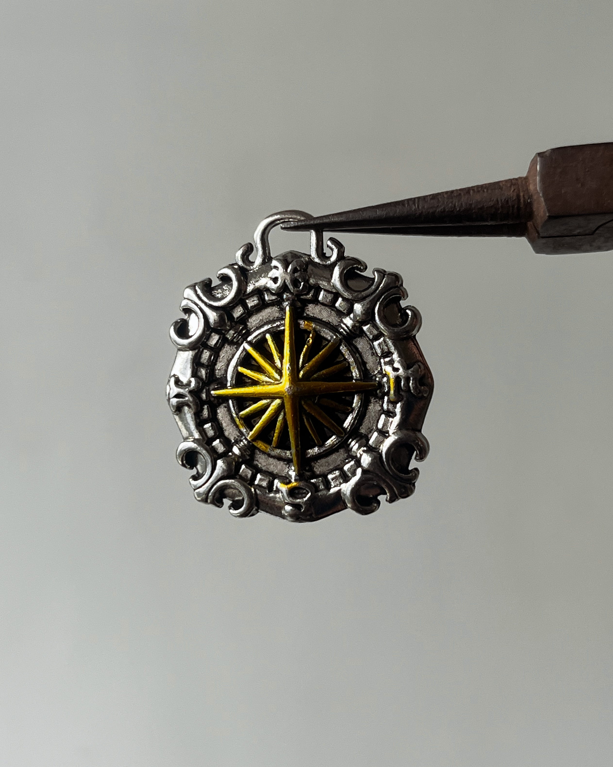 Compass charm
