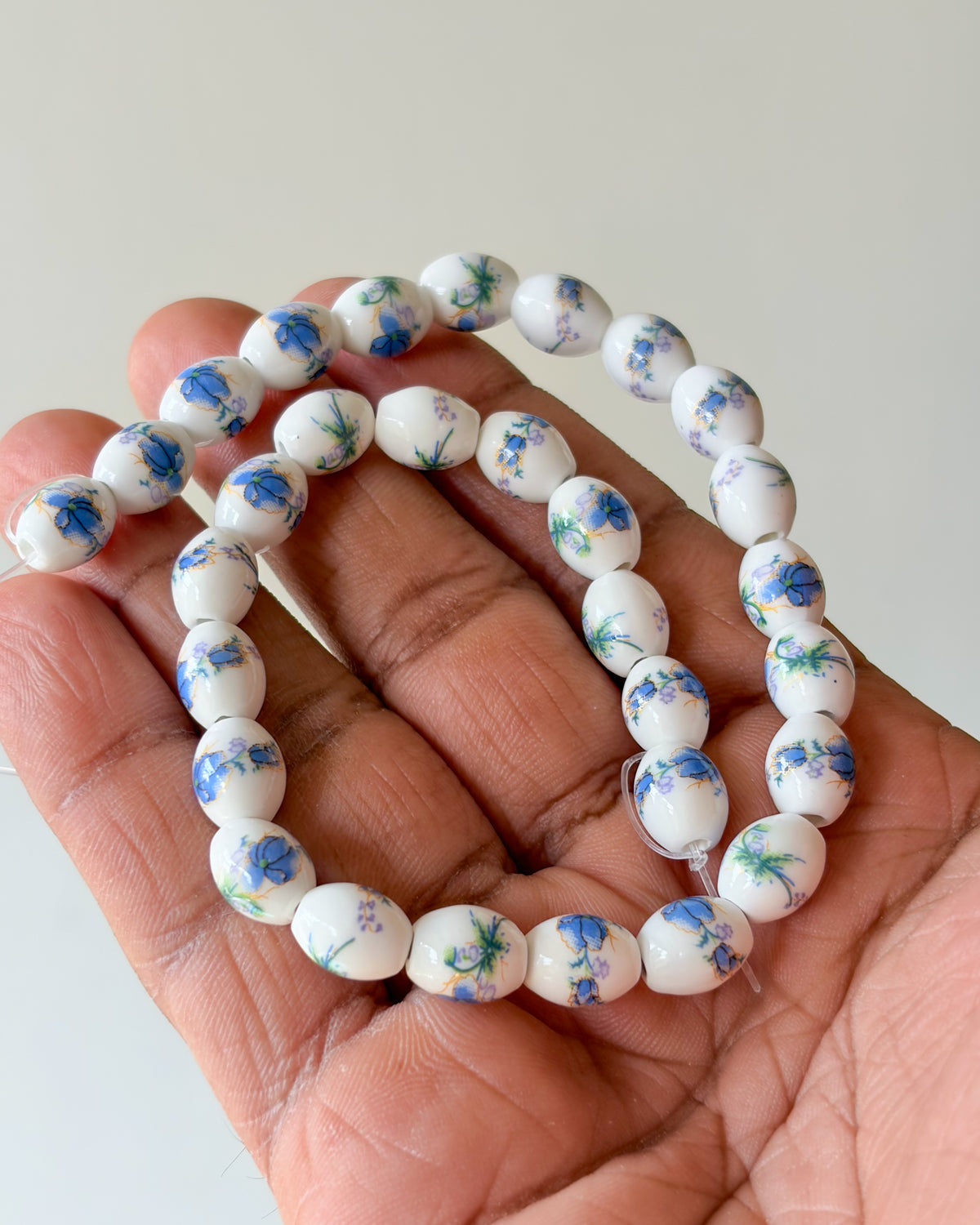 3.0 oval ceramic flower beads - 1 line