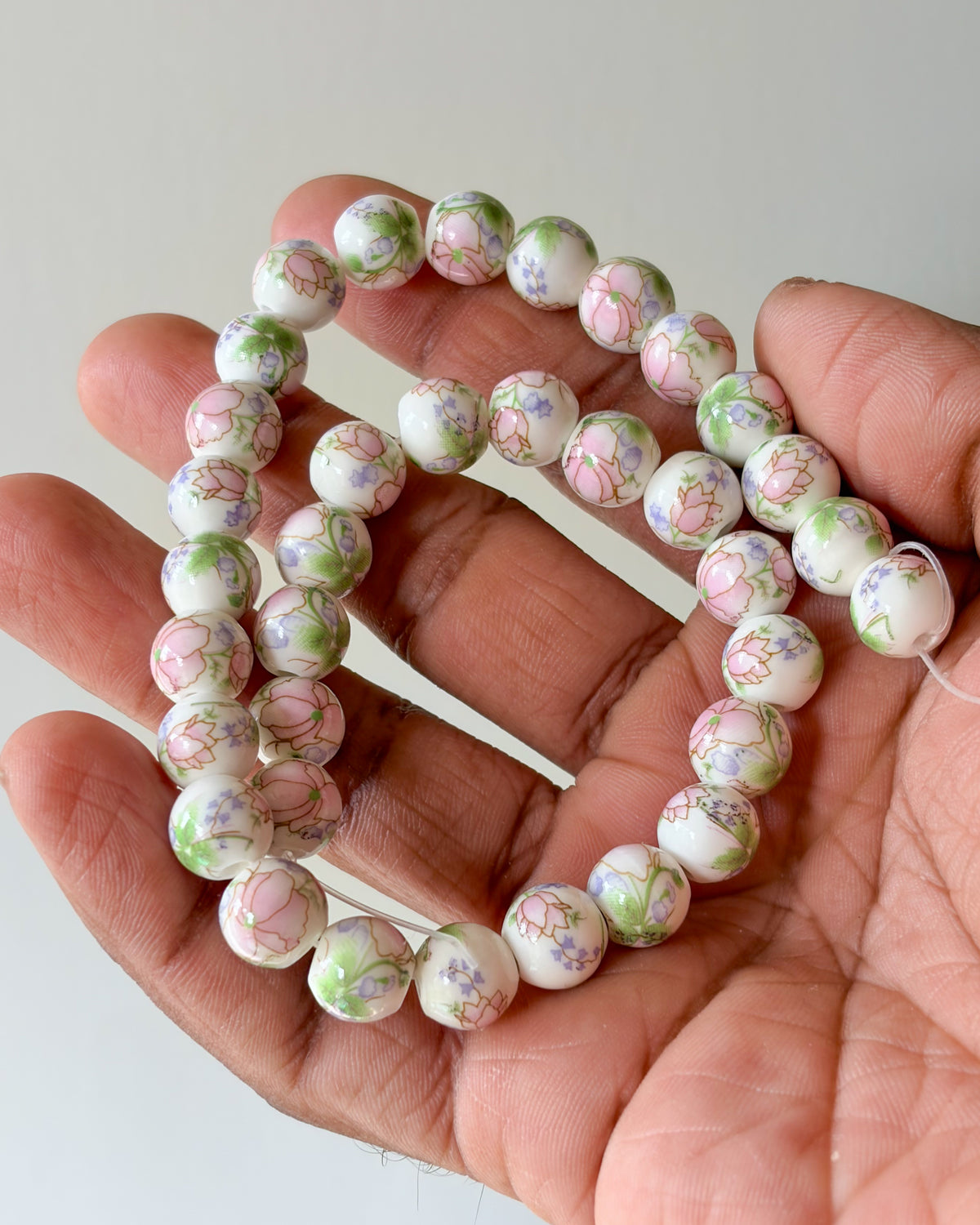 4.0 round ceramic flower beads - 1 line