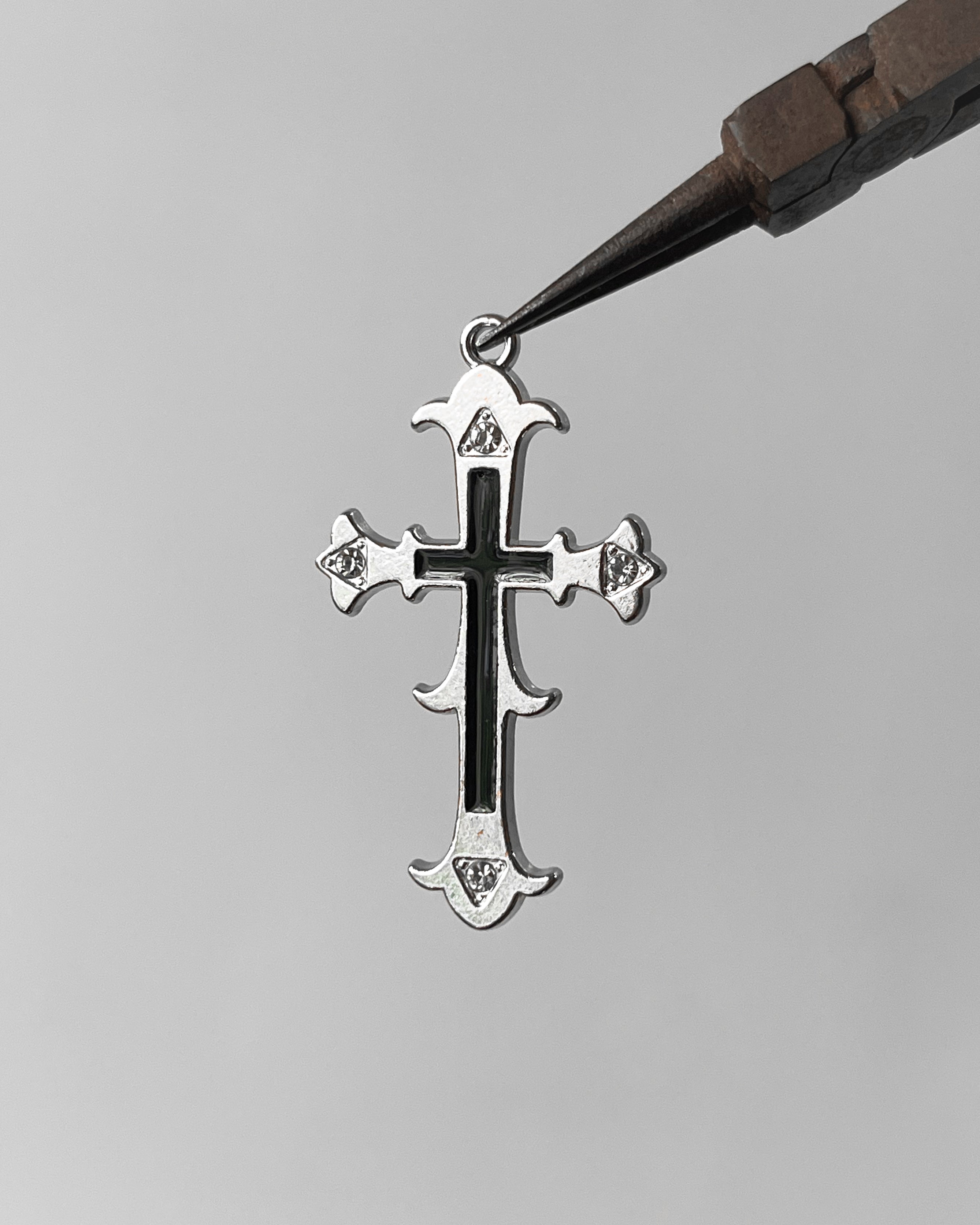 Black Stone Cross Charm
