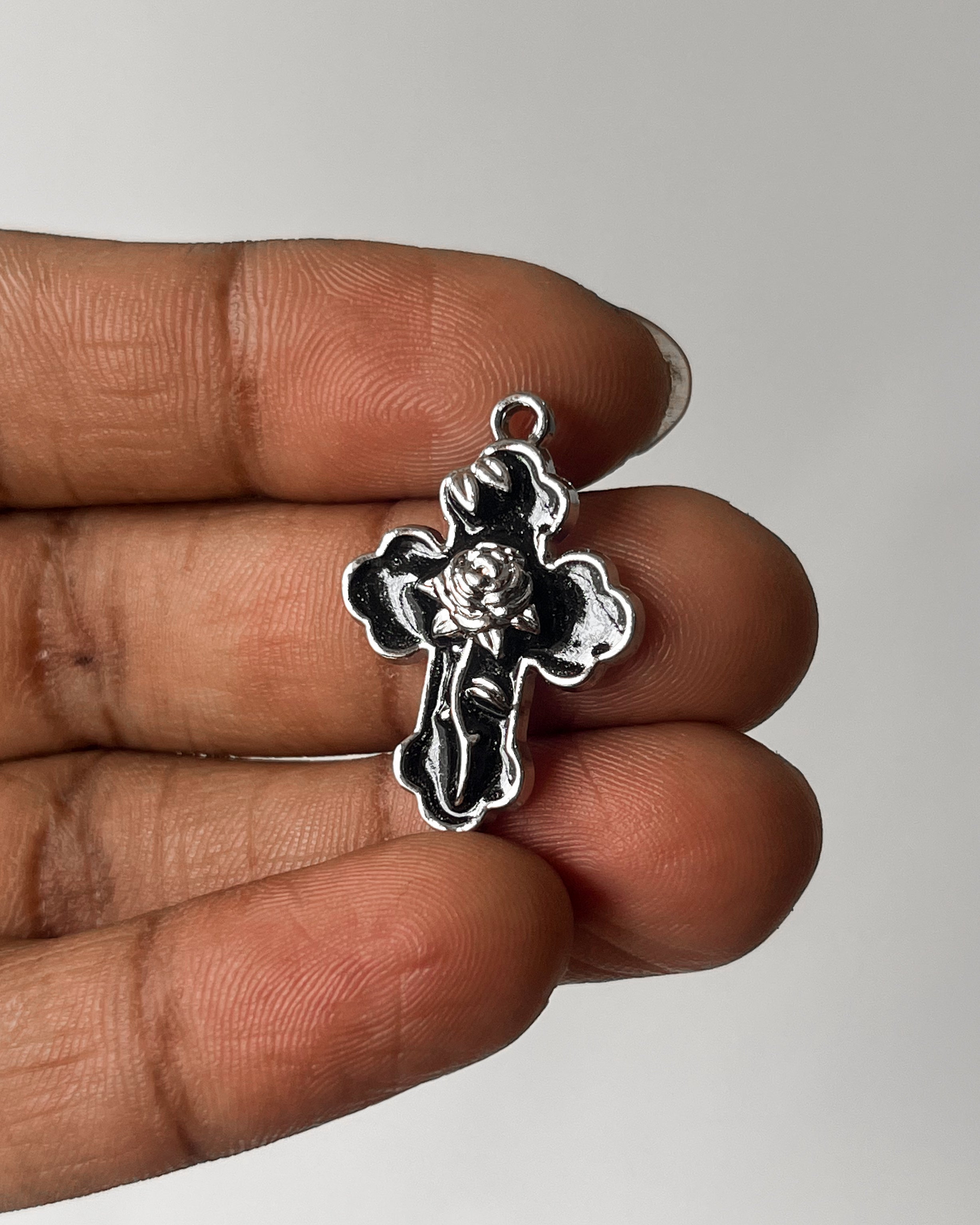 Black rose cross charm