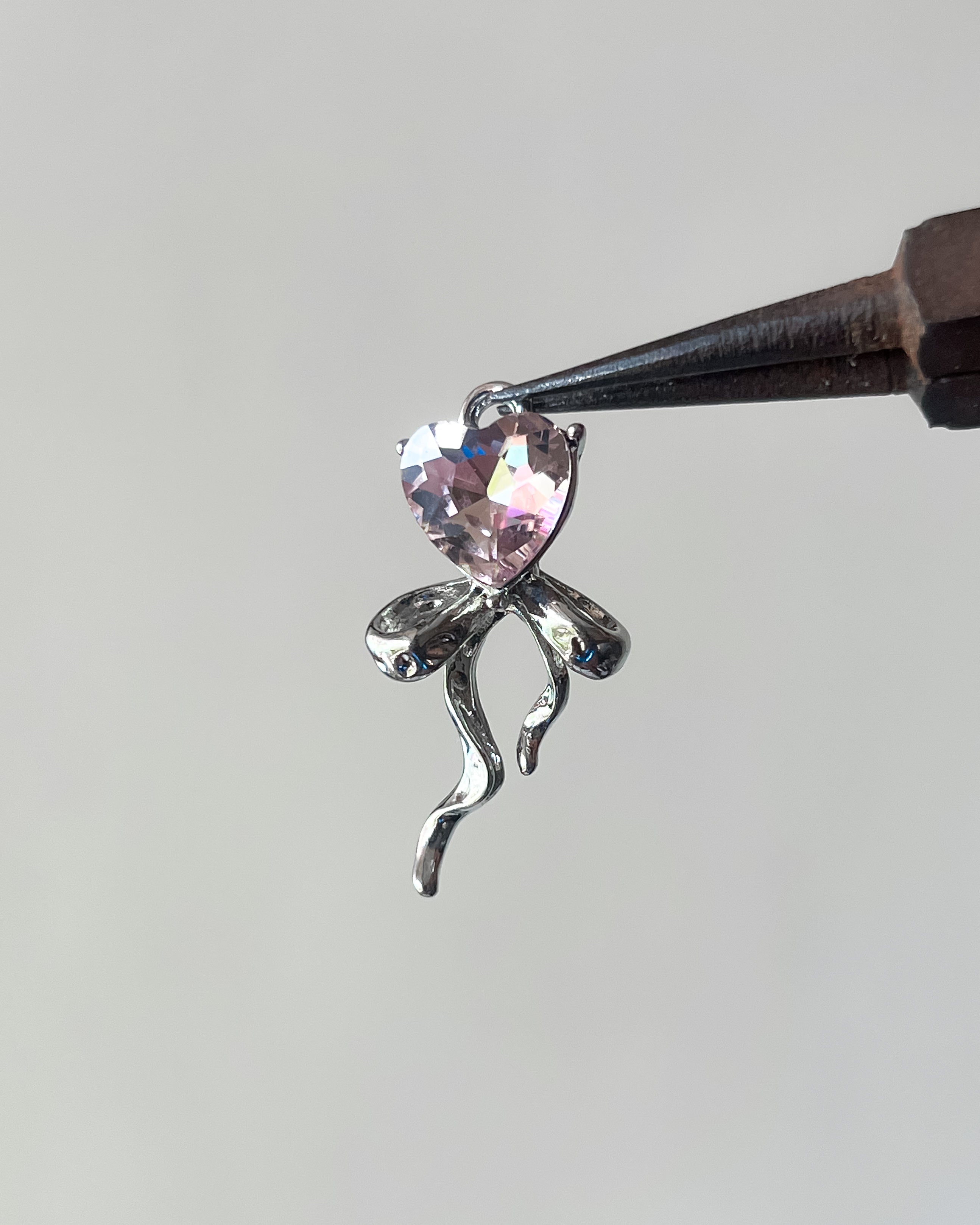 Pink heart ribbon charm