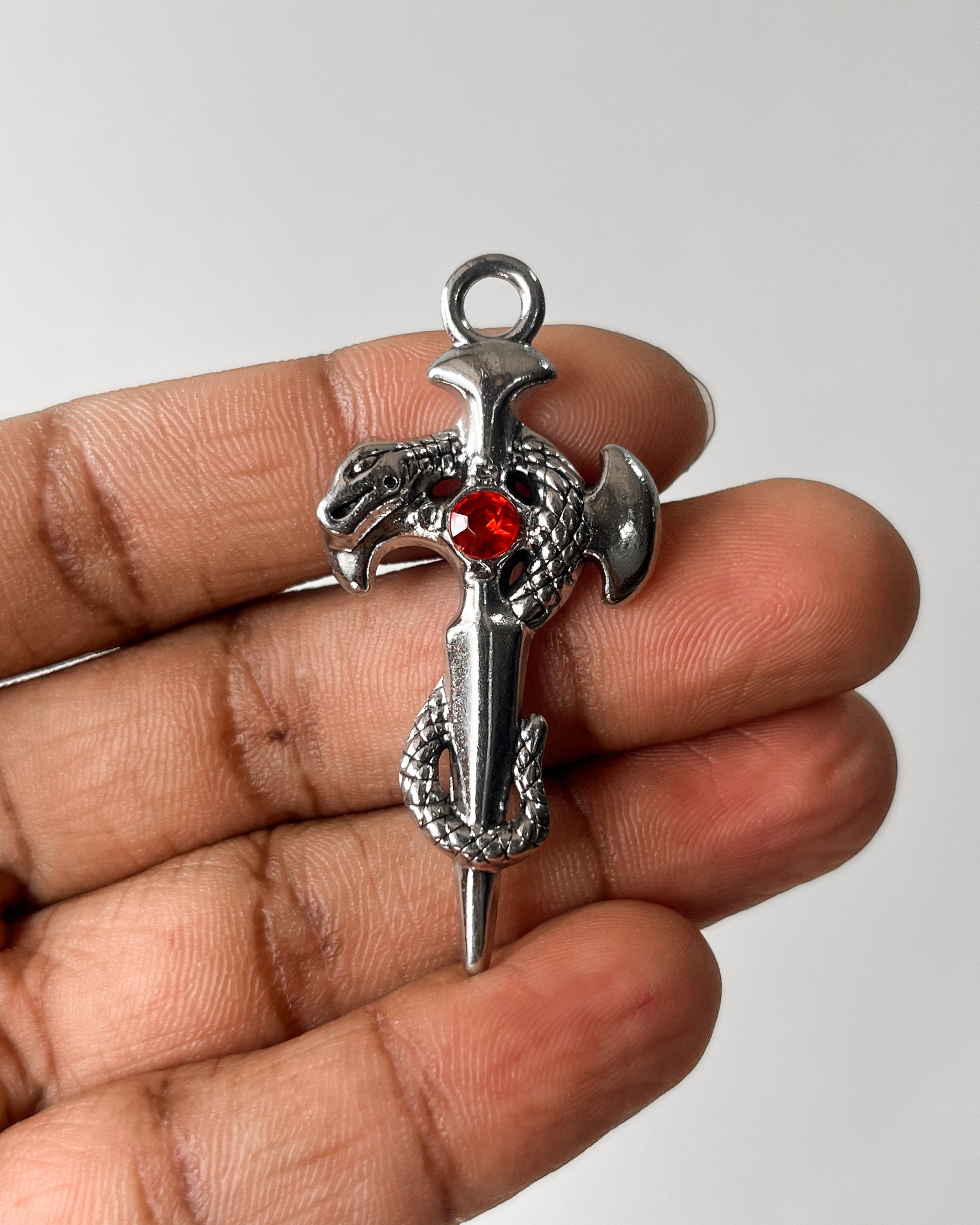 Red snake cross pendant