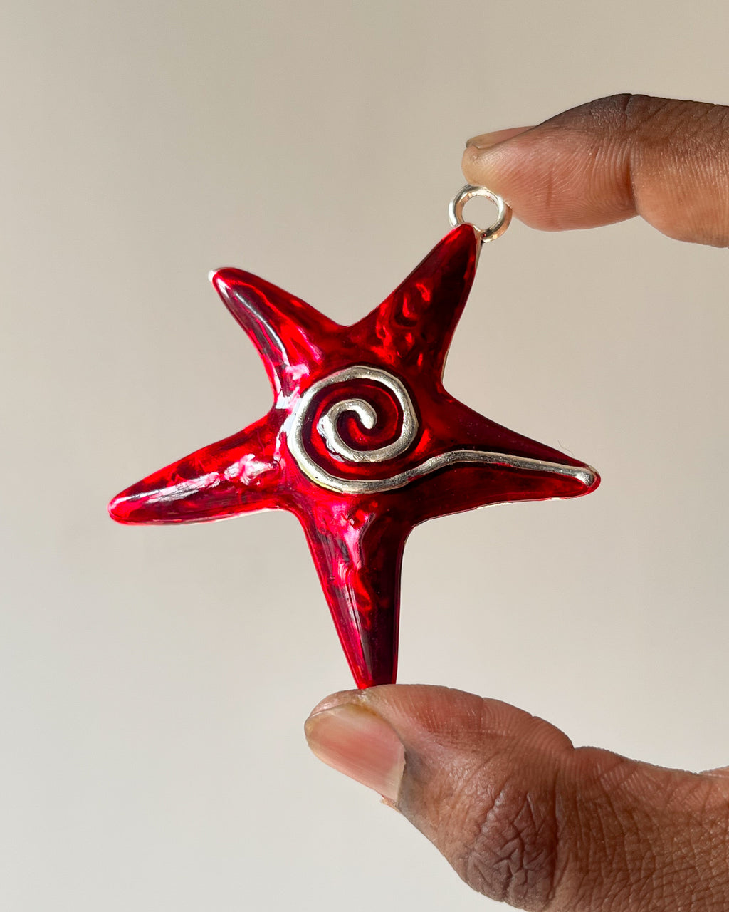 Red Star Swirl charm (designed by sonal bro)