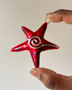 Red Star Swirl charm (designed by sonal bro)