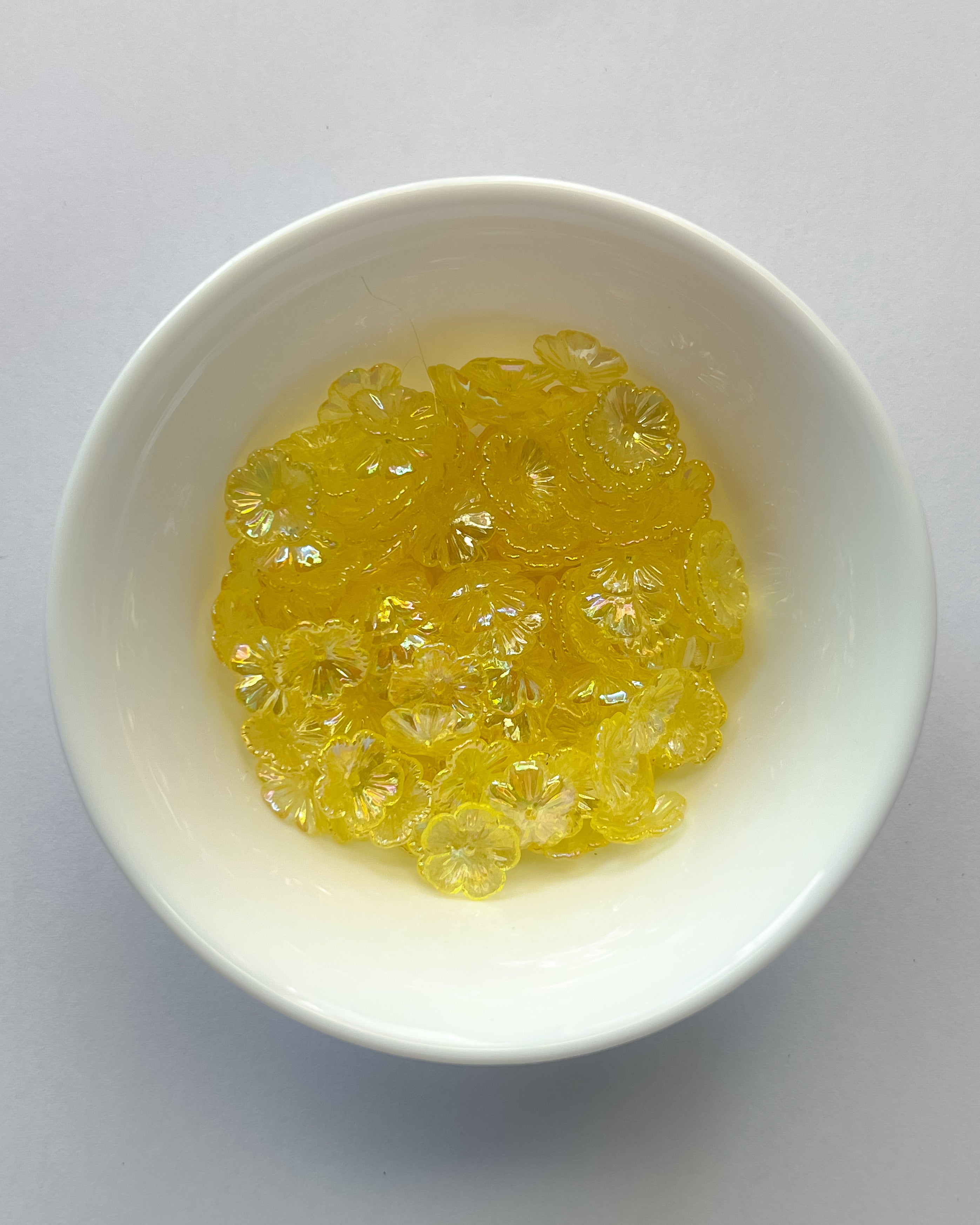 1.0 yellow Flower beads - 25 grams