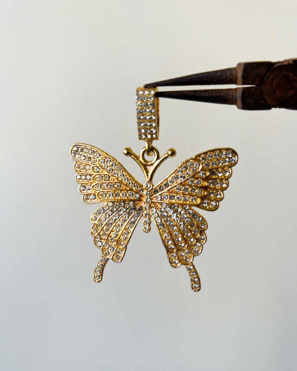 Gold iced butterfly pendants