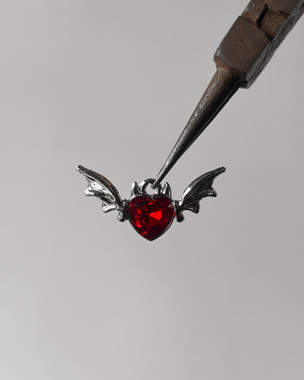 Red heart wing charm