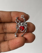 Wakda red spider charm