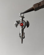 Red snake cross pendant