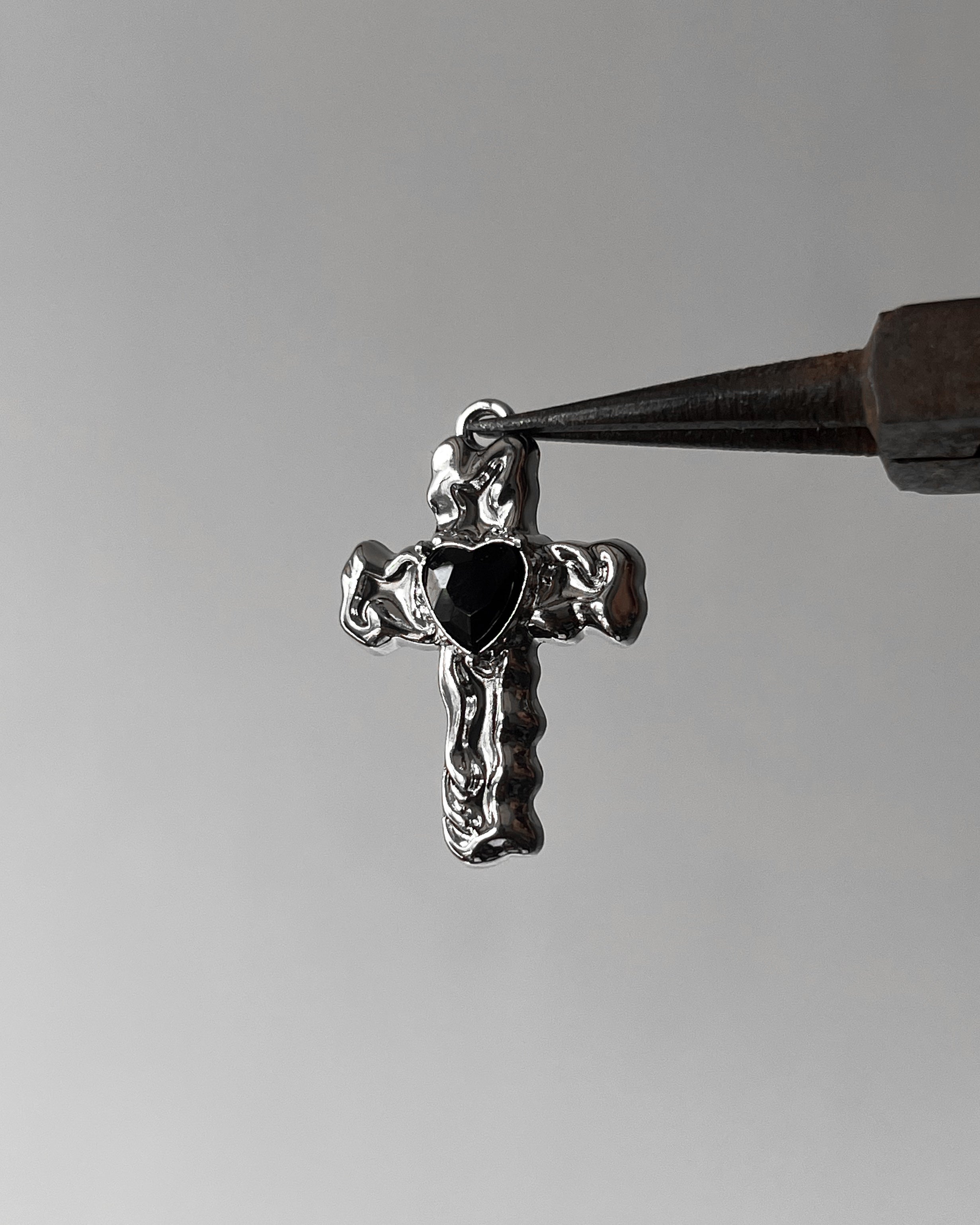 Melting black cross