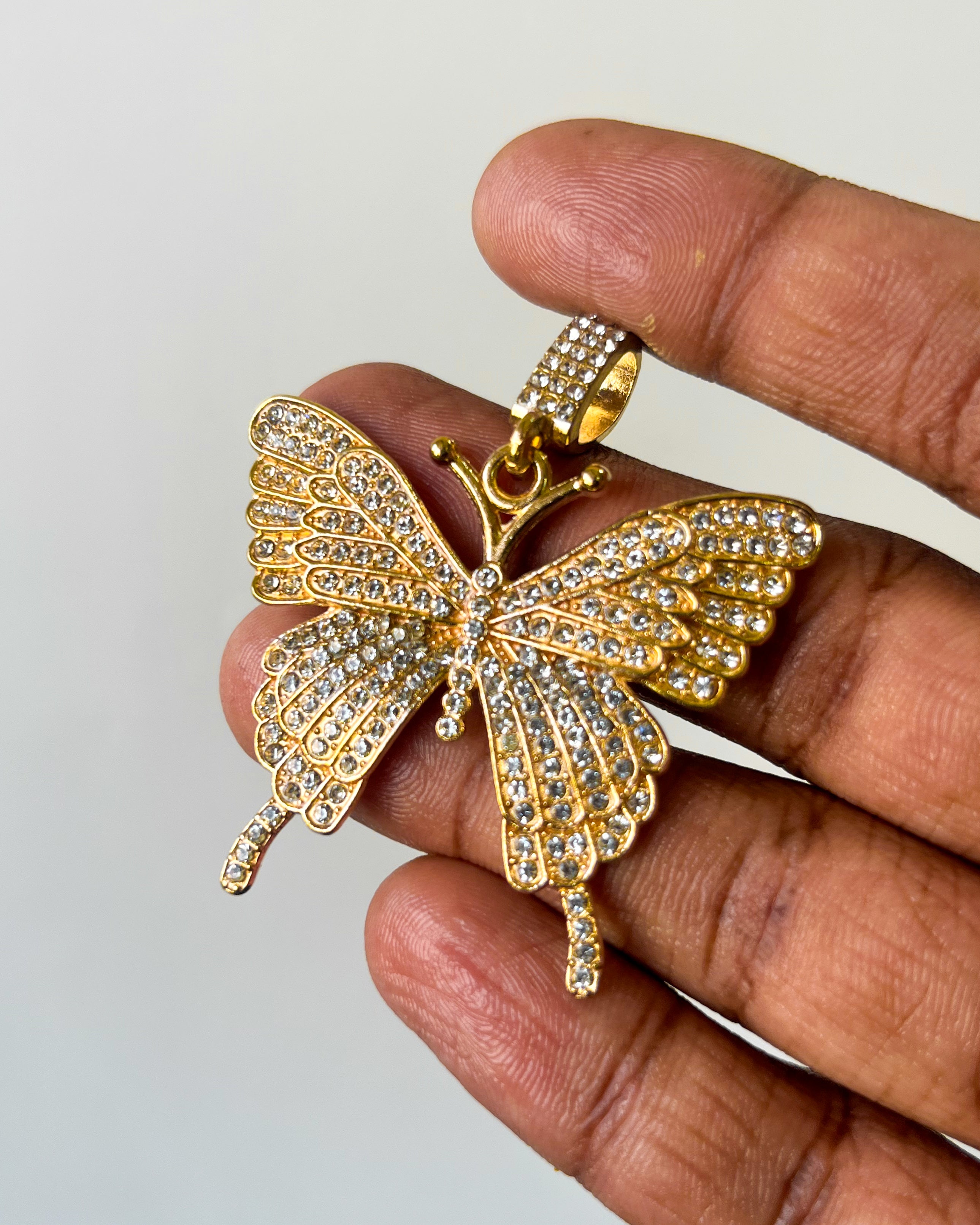 Gold iced butterfly pendants