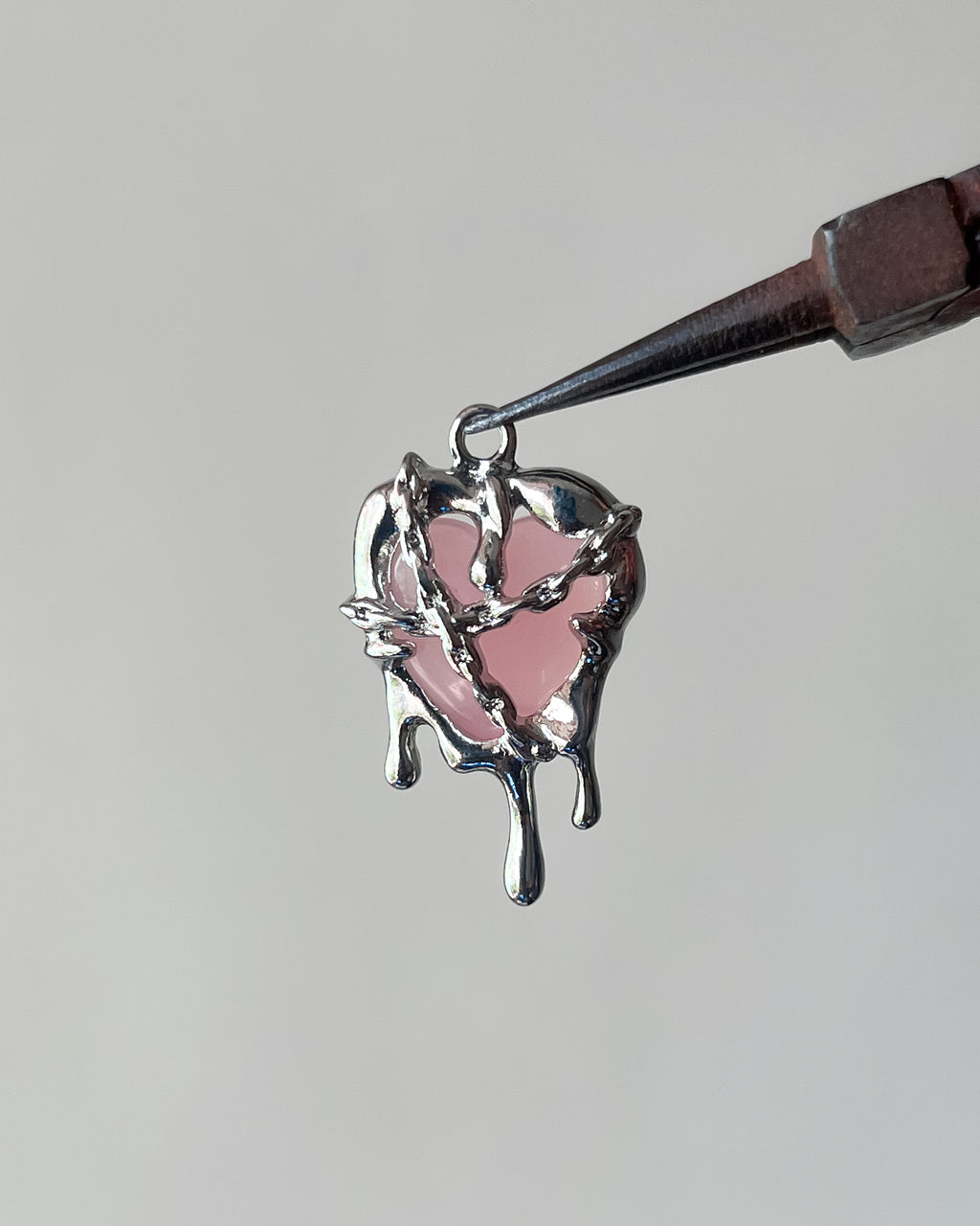 Melting pink heart charm