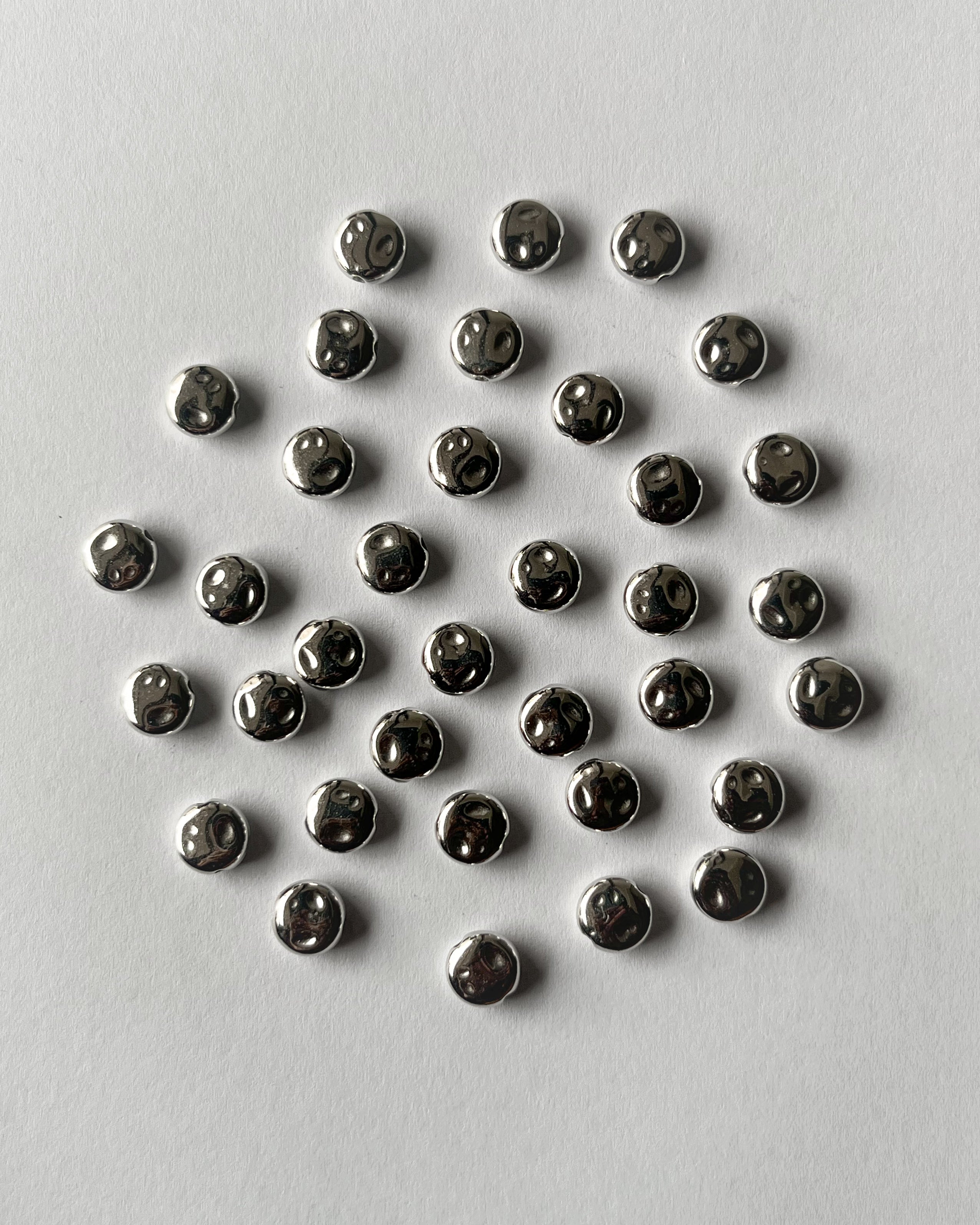 2 Uneven metallic CCB bead // 25 grams