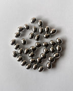 4 Uneven metallic CCB bead // 25 grams