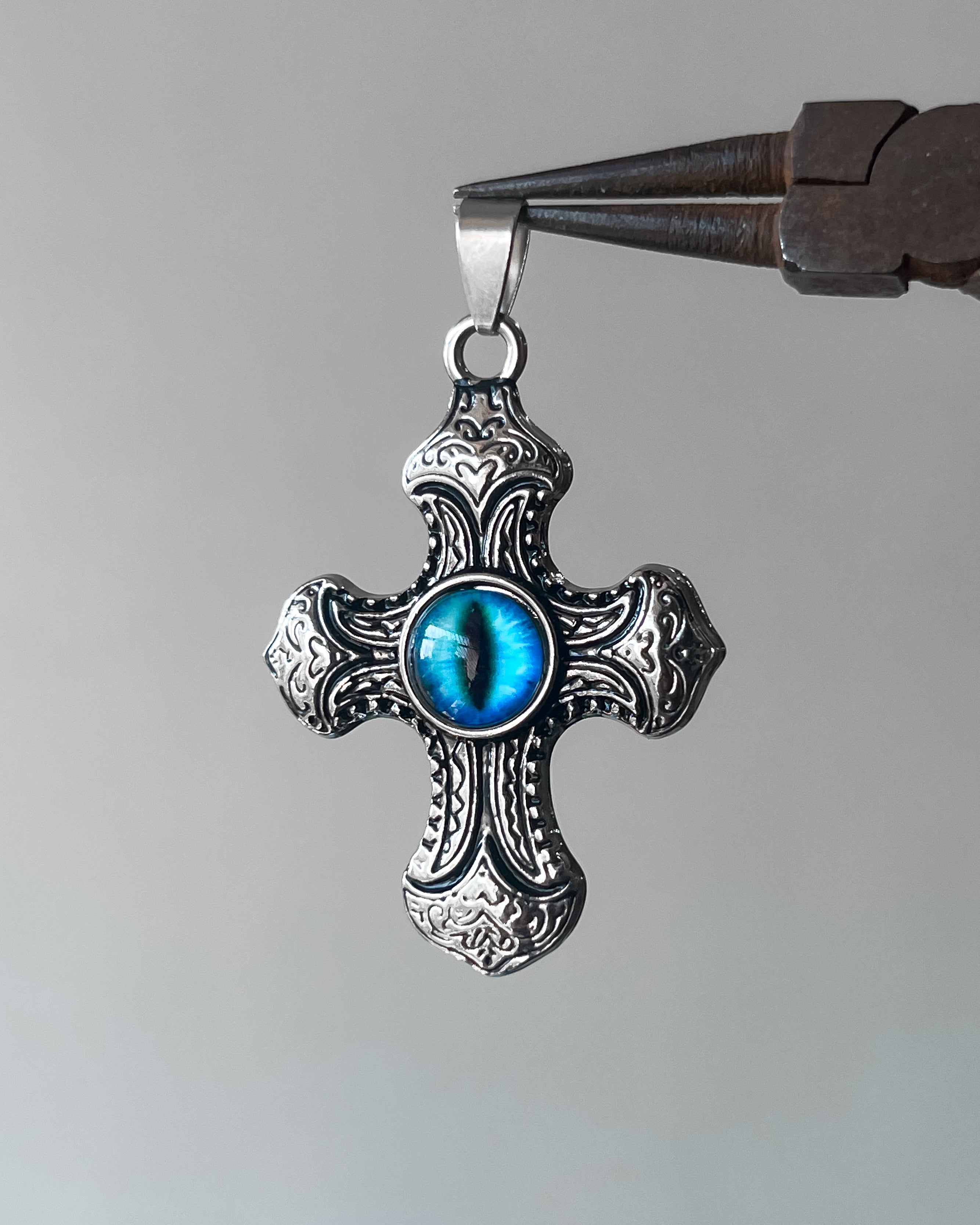 Devil eye cross pendant