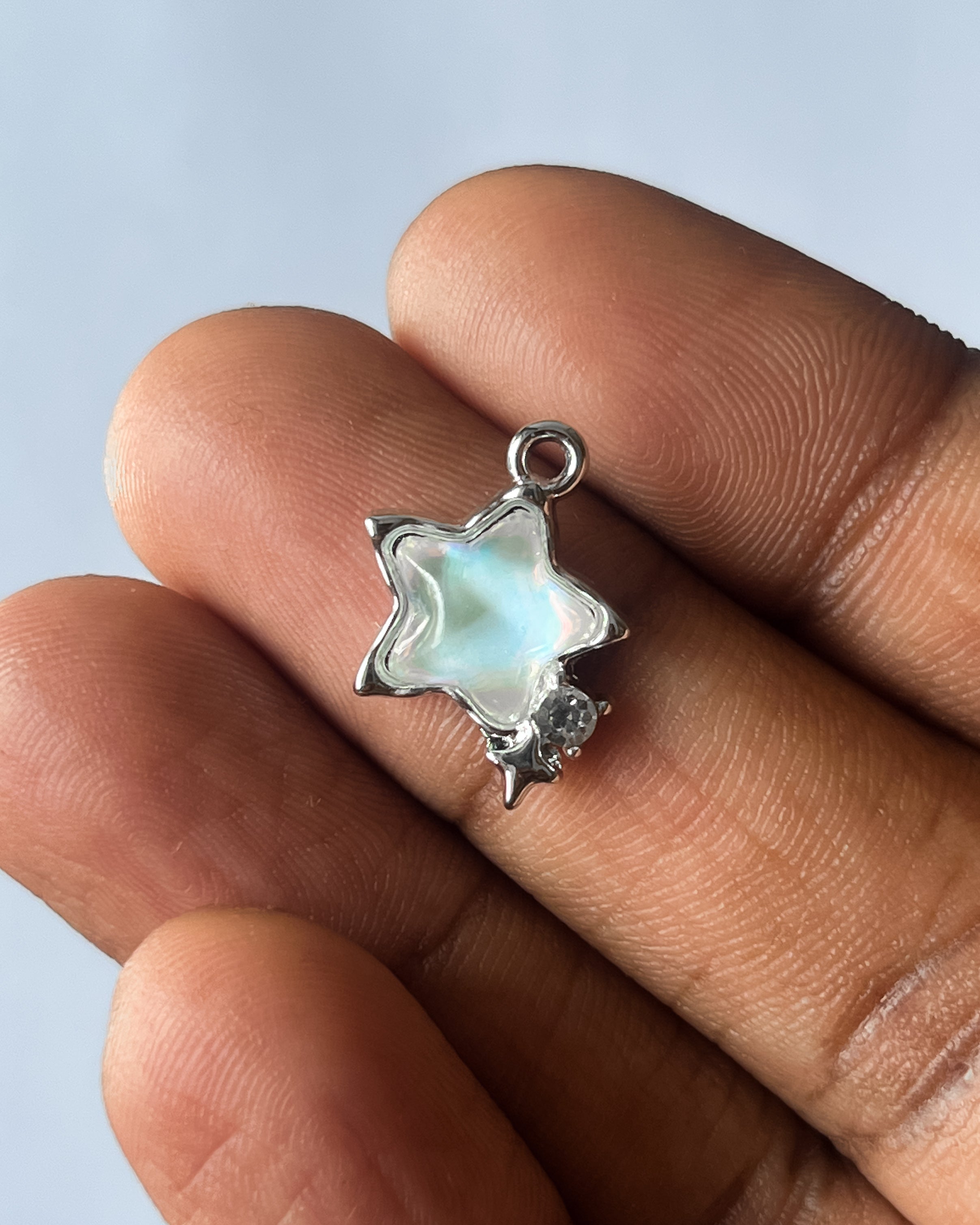Opal star charm