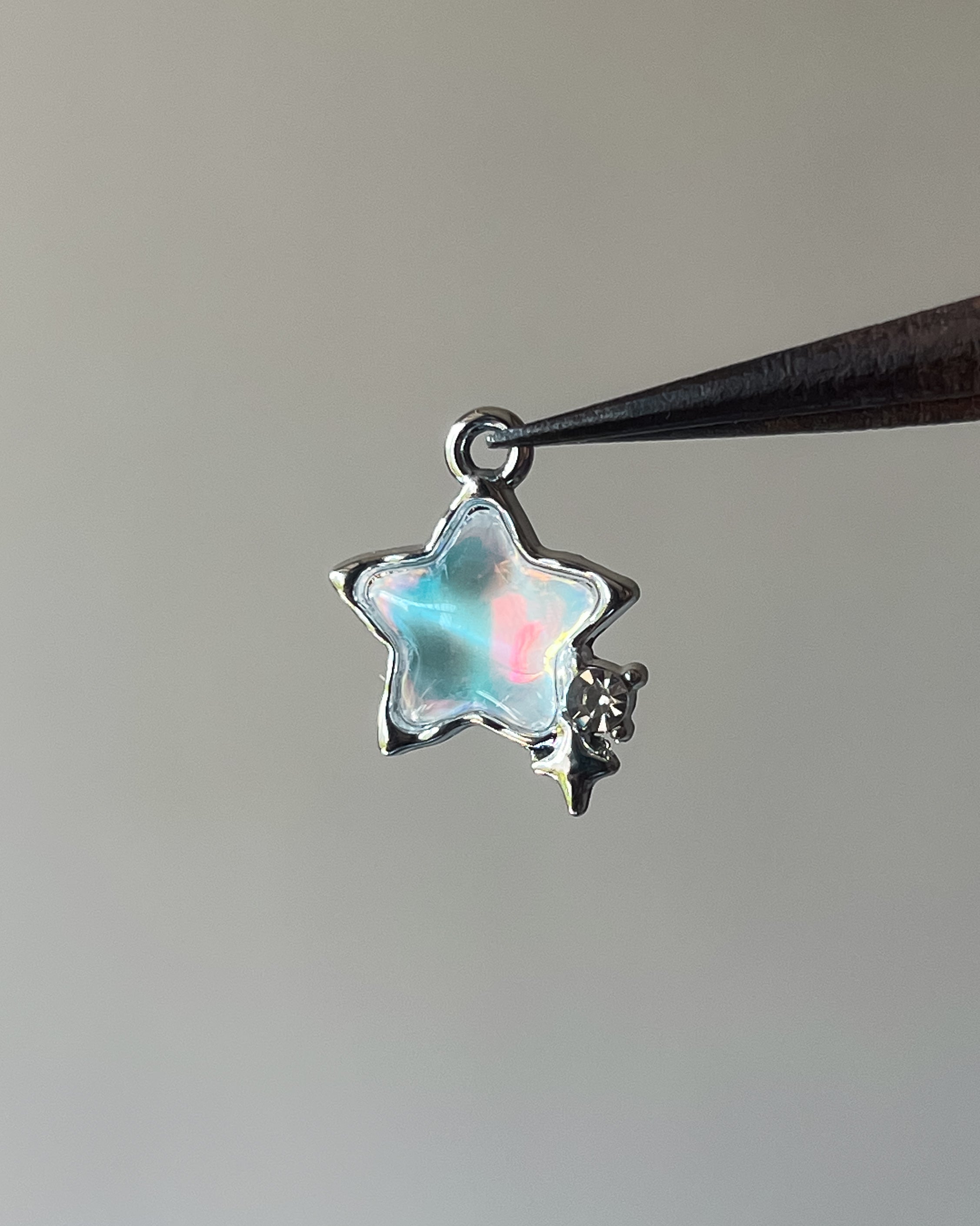 Opal star charm