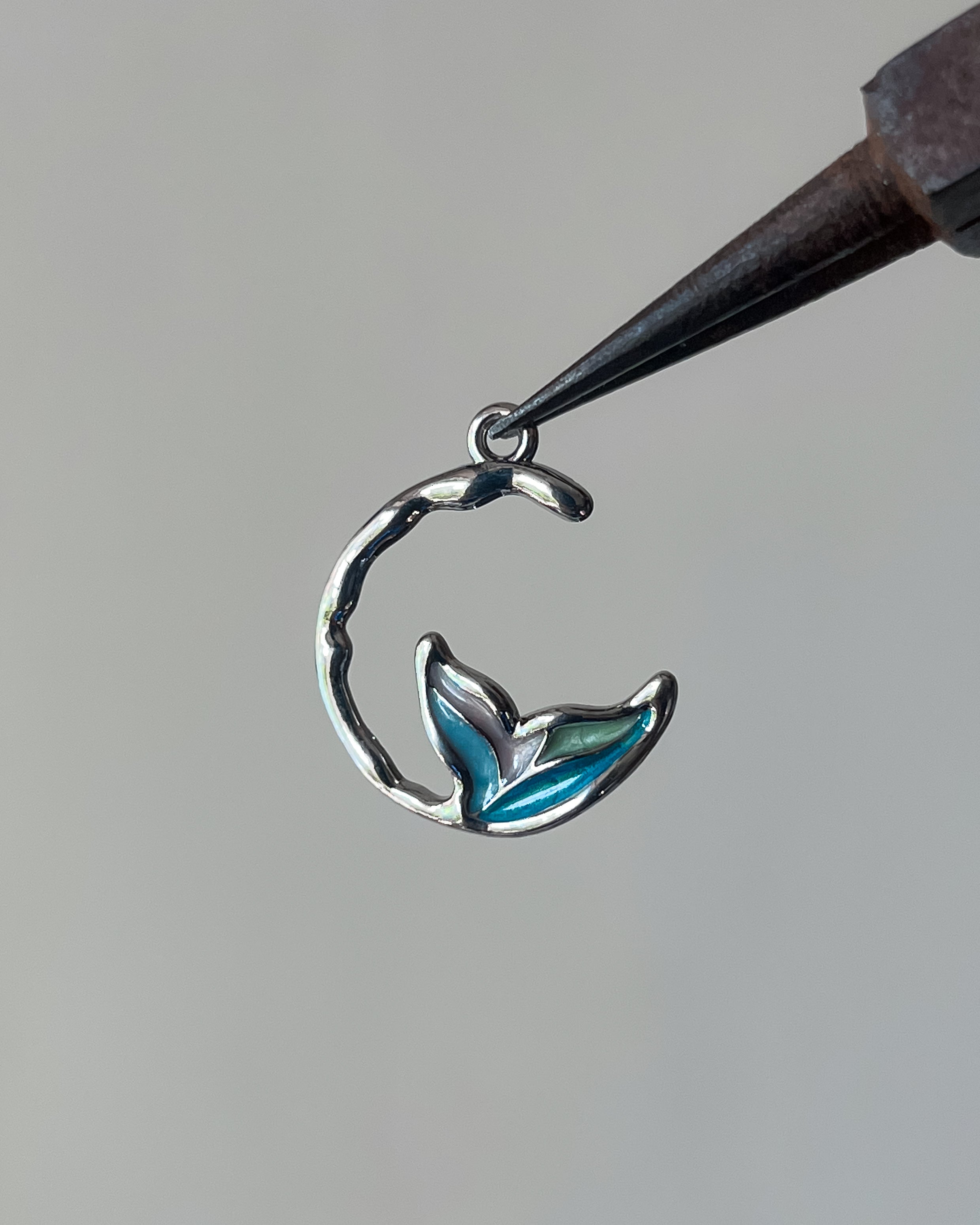 Fish tail moon charm