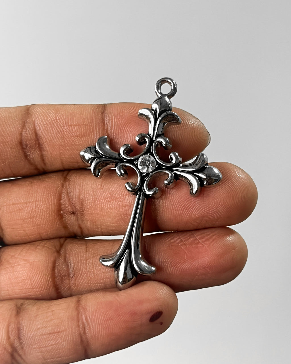 Chrome cross Charm