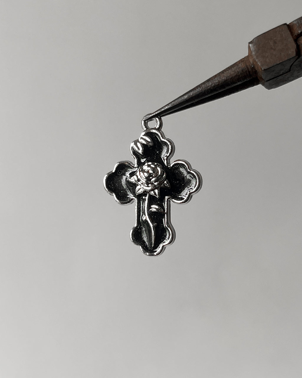 Black rose cross charm