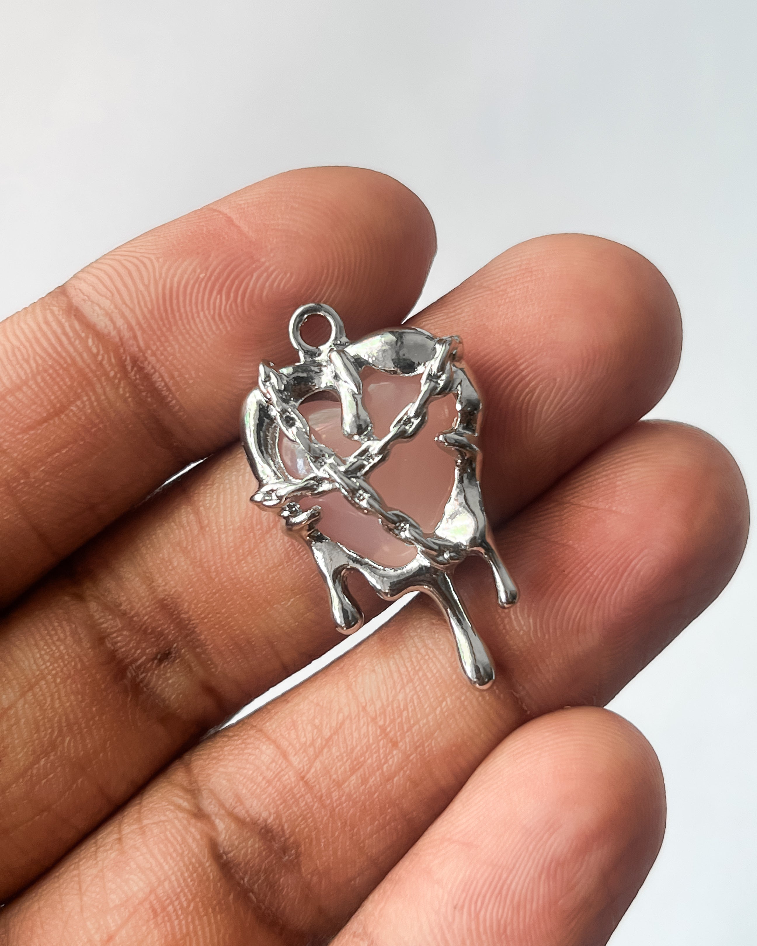 Melting pink heart charm