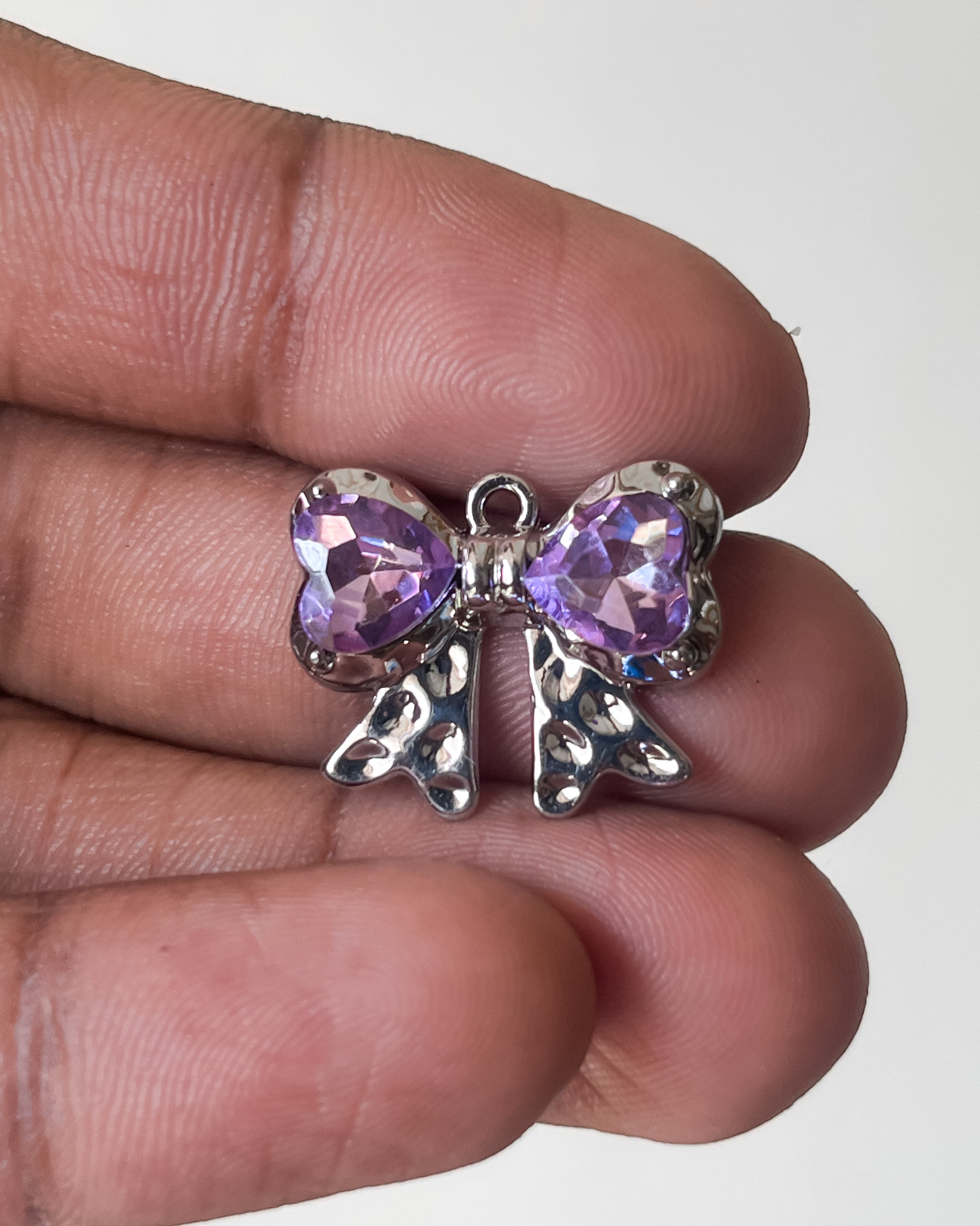 Purple bow charm