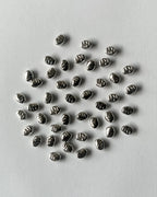 3 Uneven metallic CCB bead // 25 grams