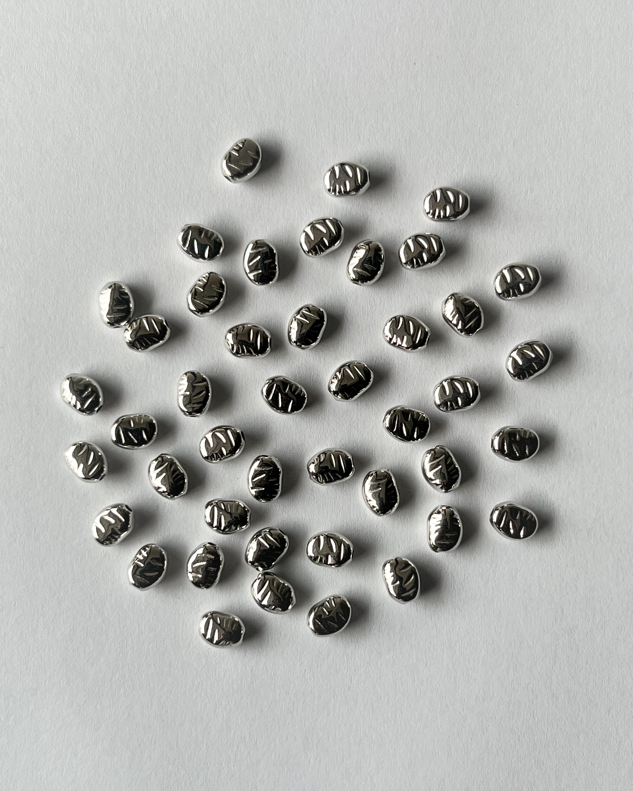 3 Uneven metallic CCB bead // 25 grams