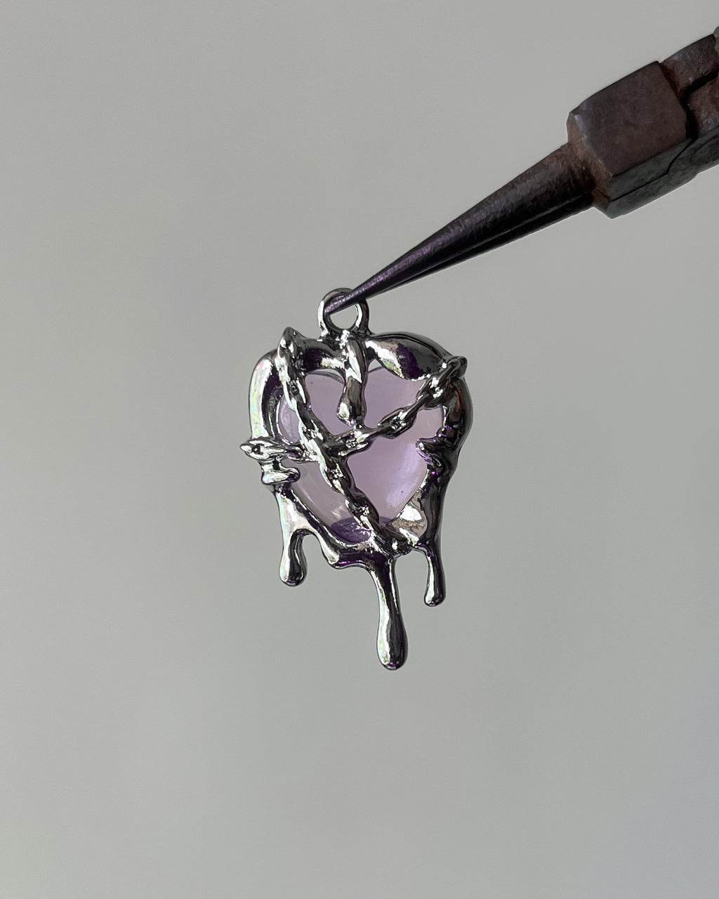 Melting purple heart charm