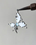 Icy white butterfly charm