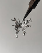 White butterfly charm