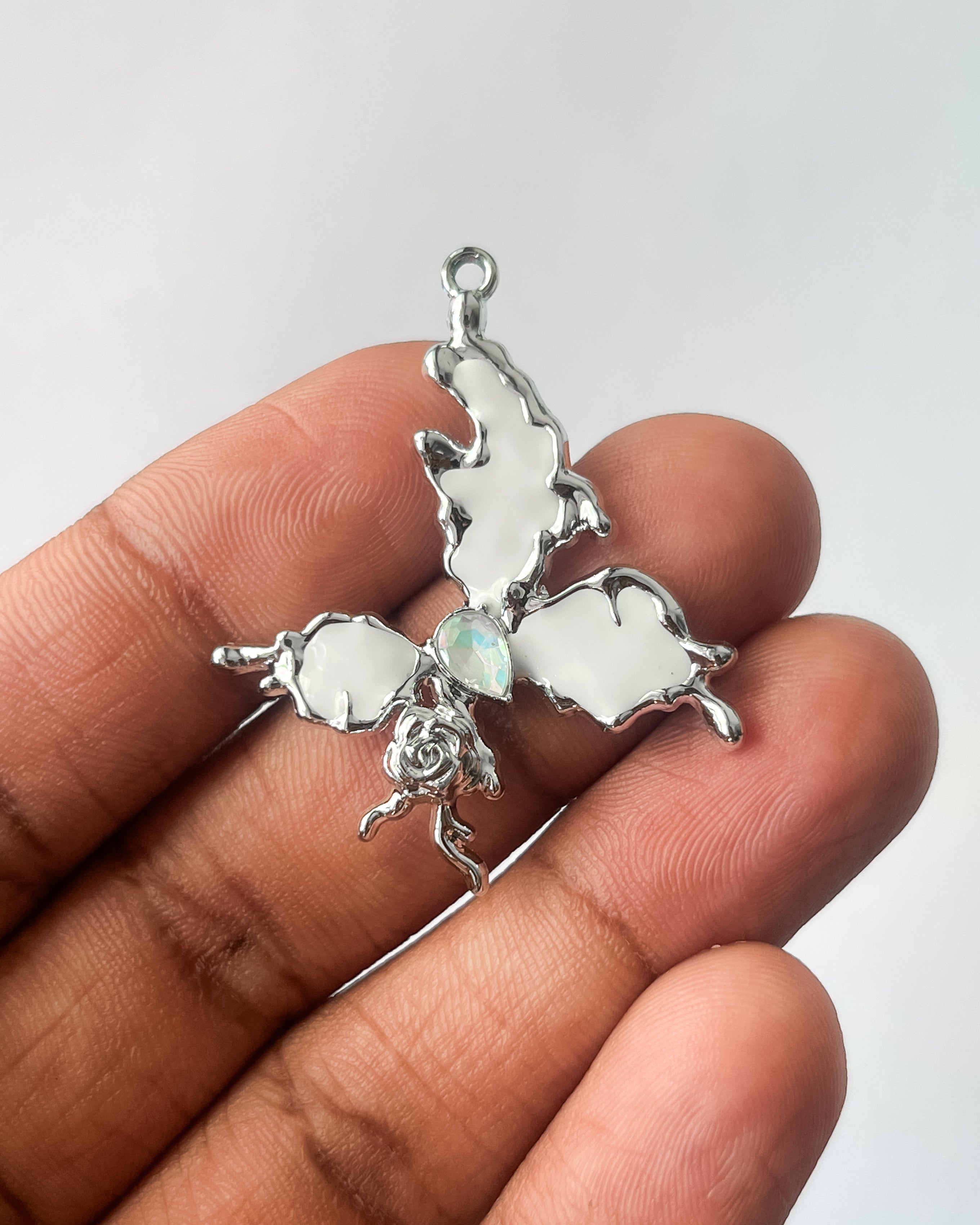 Icy white butterfly charm