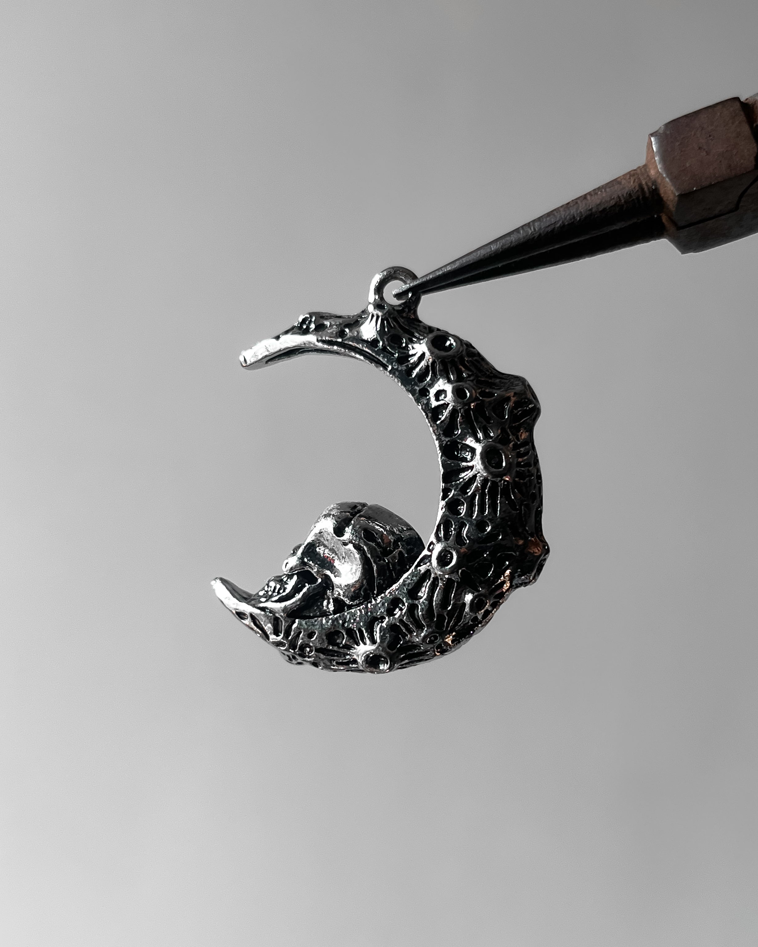 Skull moon pendant