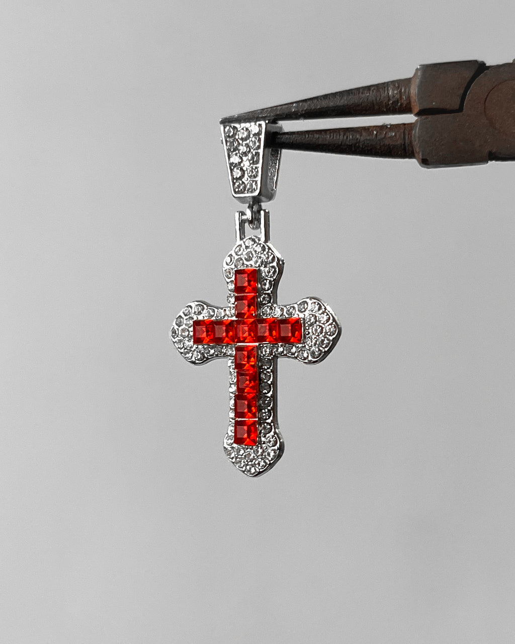 Red stone cross charm