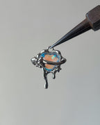 Heart saturn charm