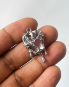 Melting purple heart charm
