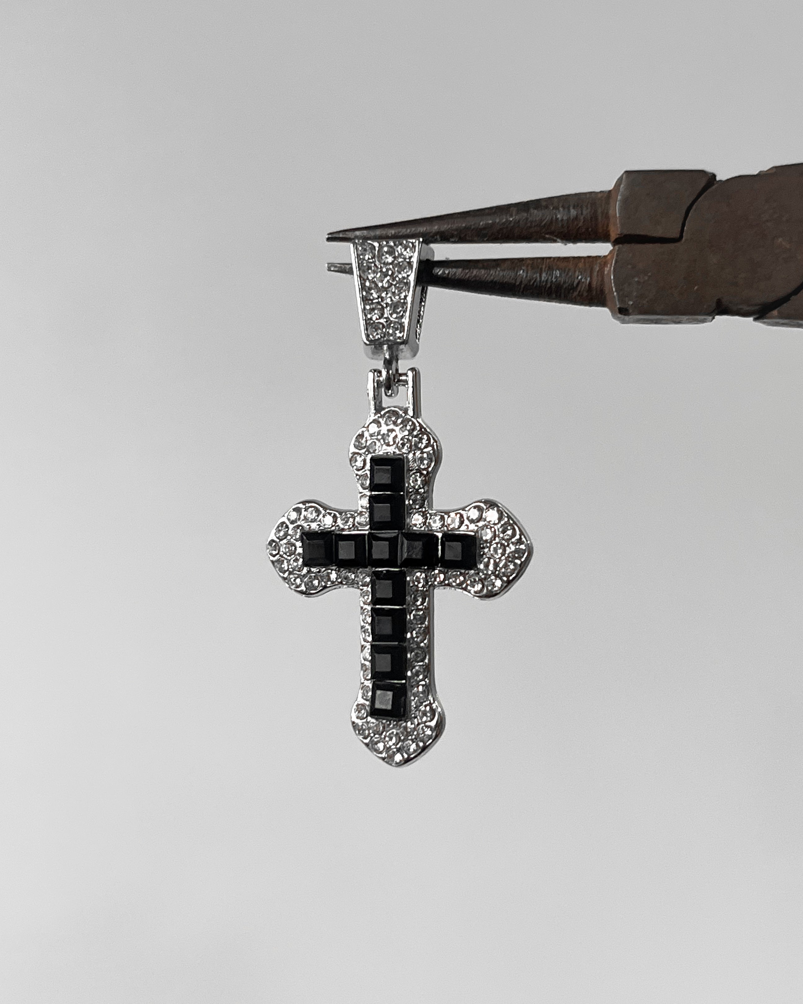 Iced out black cross
