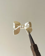 Pearl bow : 1  // 50 gms pack