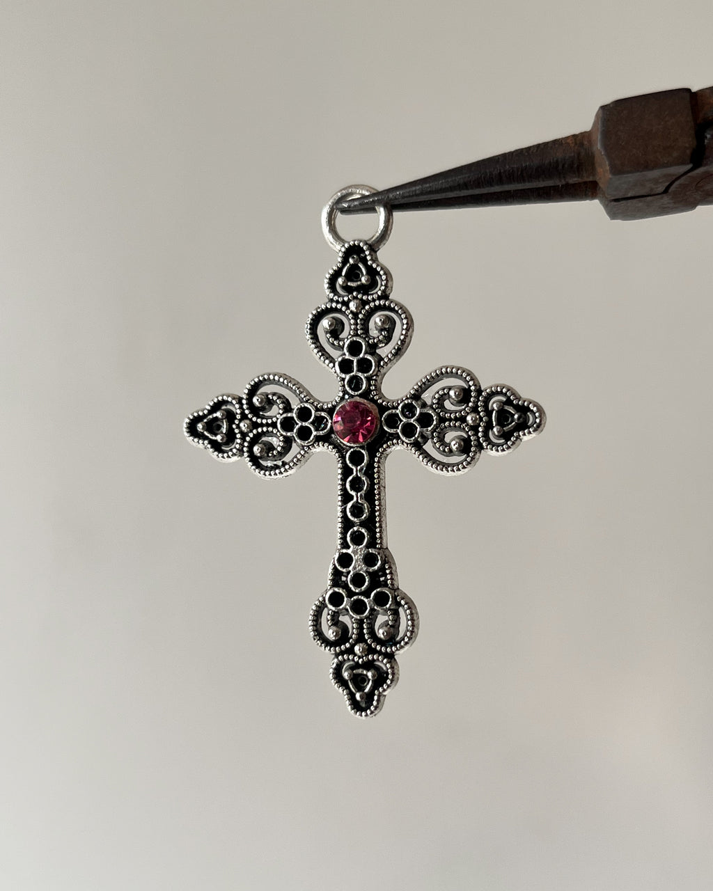 Pink cross charm