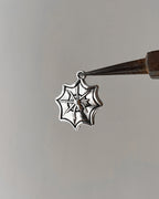 Spider web charm