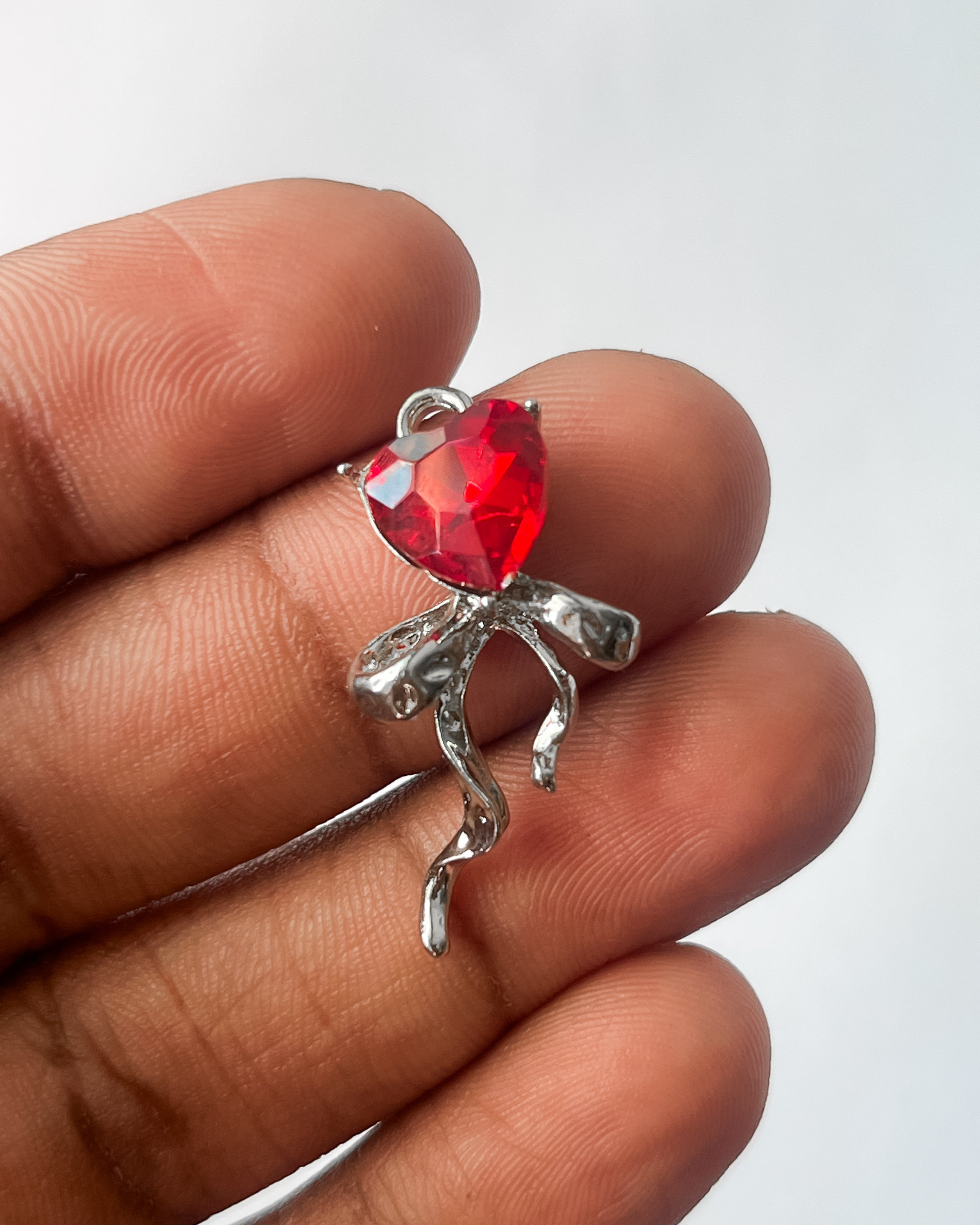 Red heart ribbon charm