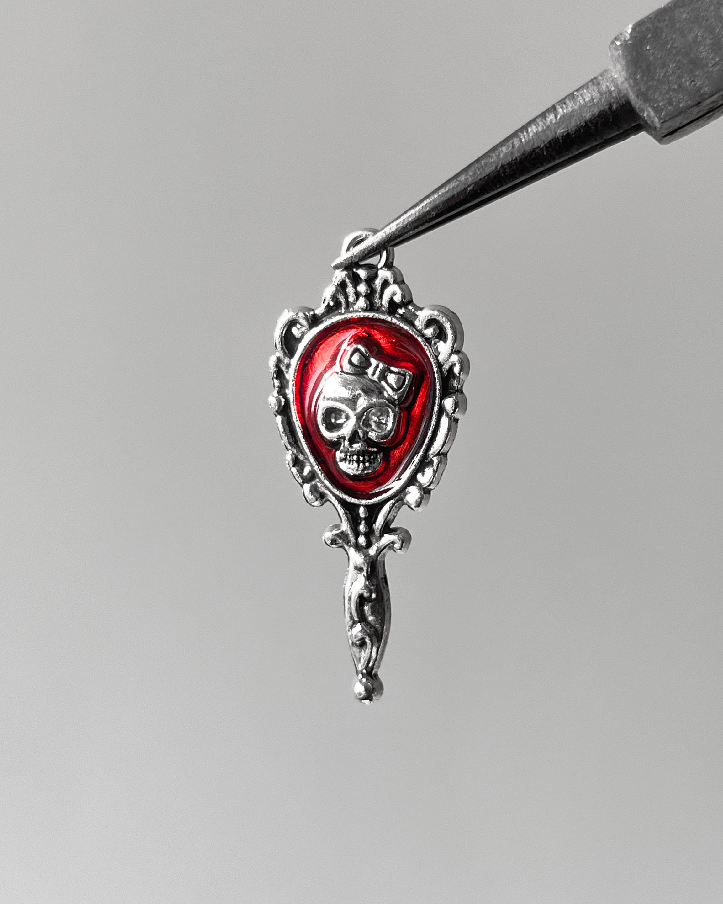 Mirror skull charm