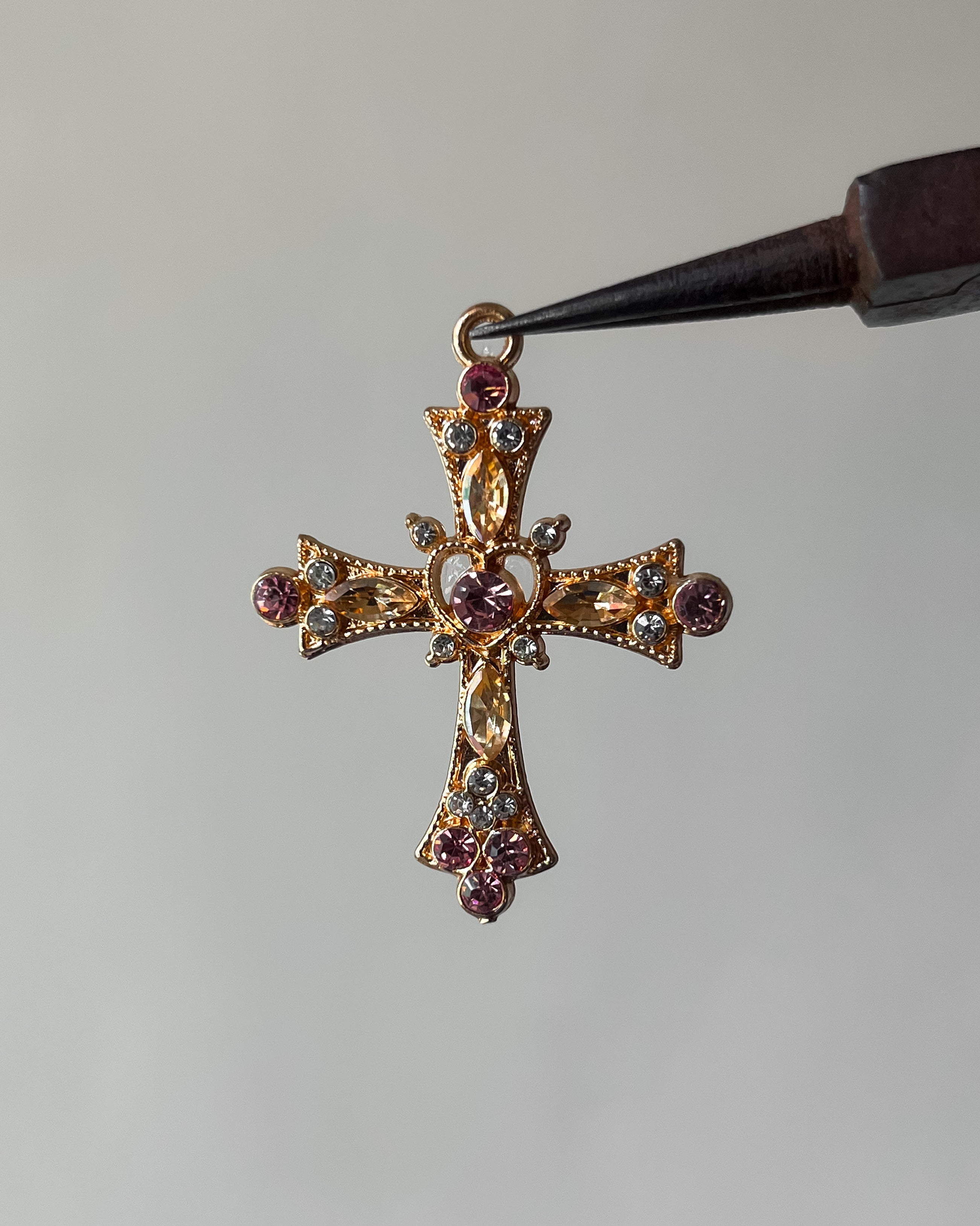 Gold pookie cross