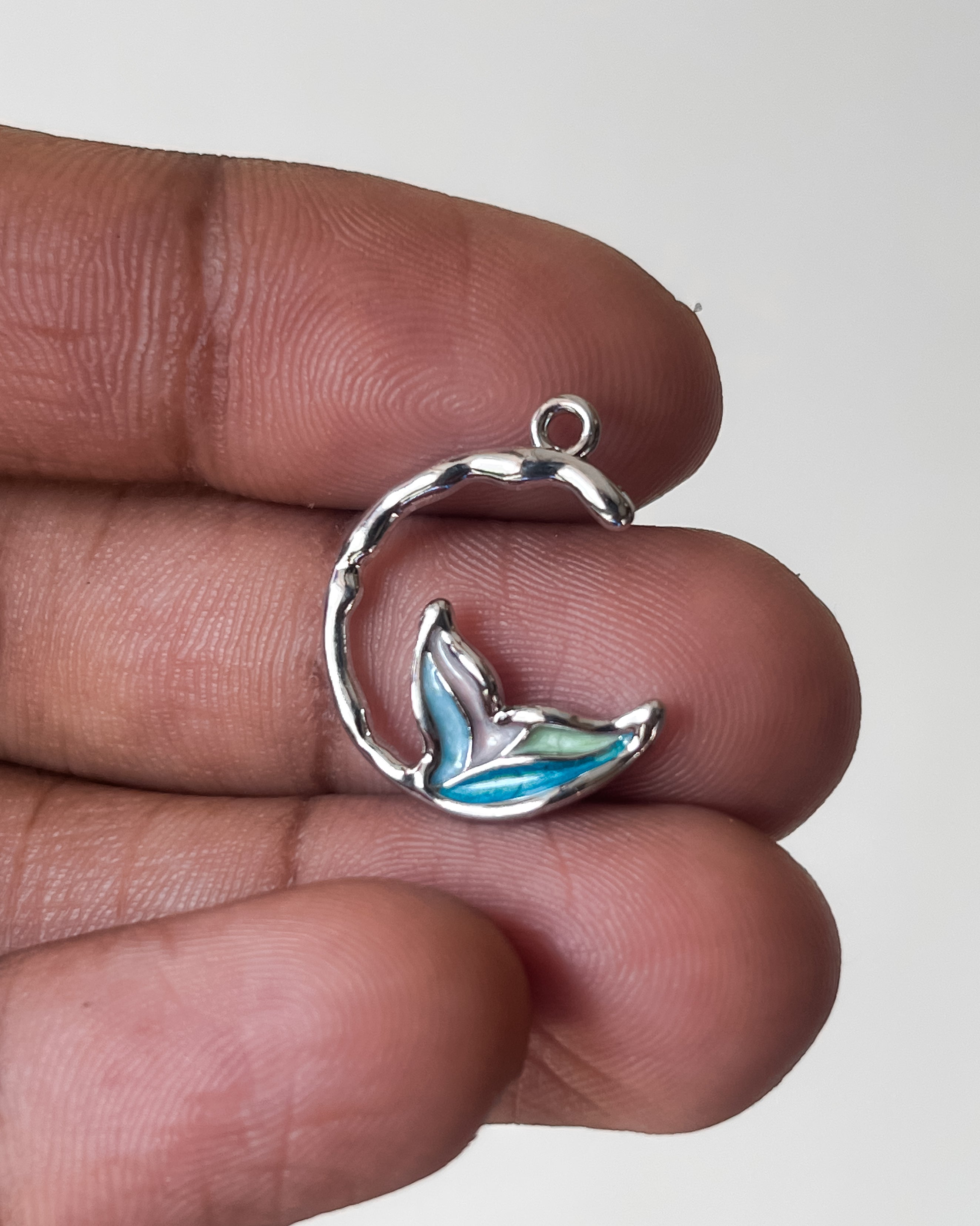 Fish tail moon charm