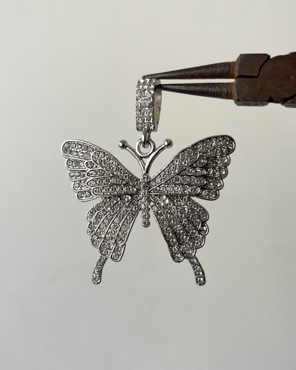 Silver iced butterfly pendants