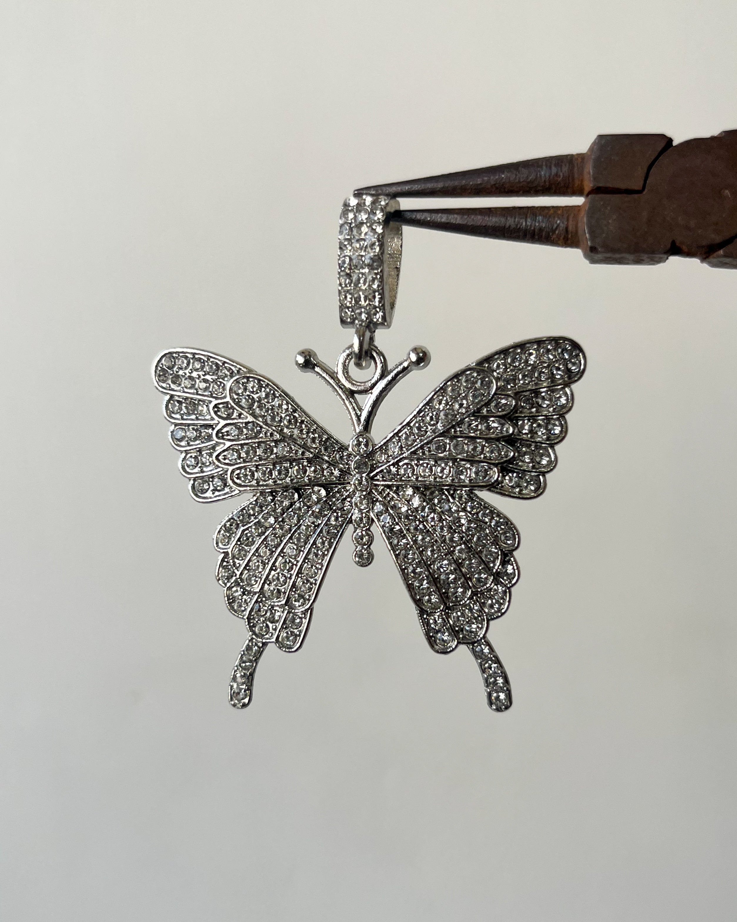Silver iced butterfly pendants