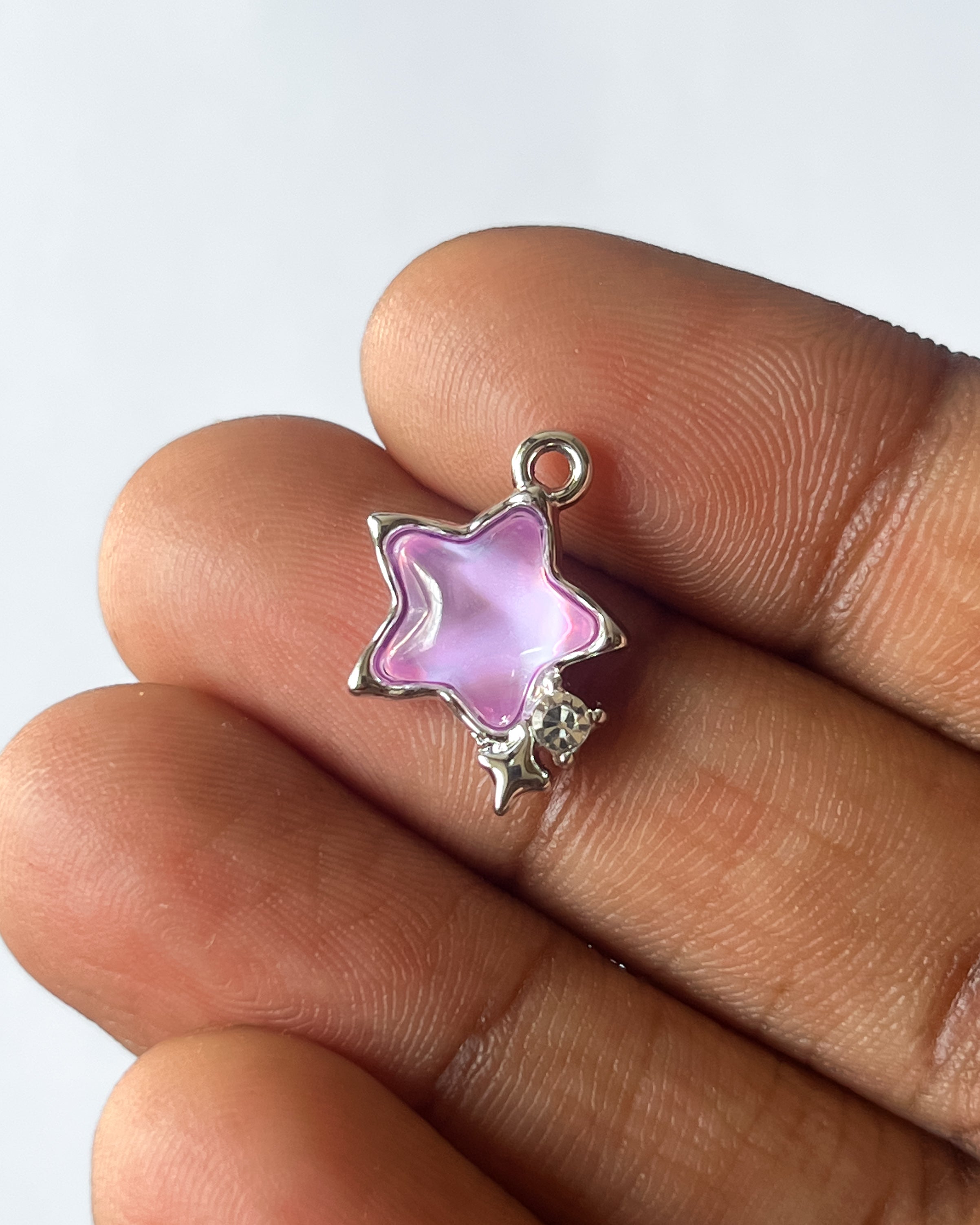 Purple star charm