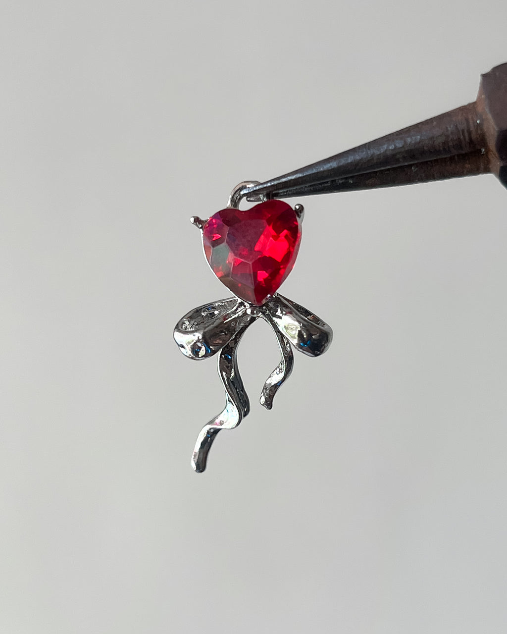 Red heart ribbon charm